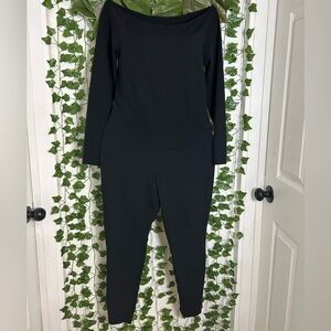 Torrid Black Sleeveless Jumpsuit with Tapered Legs